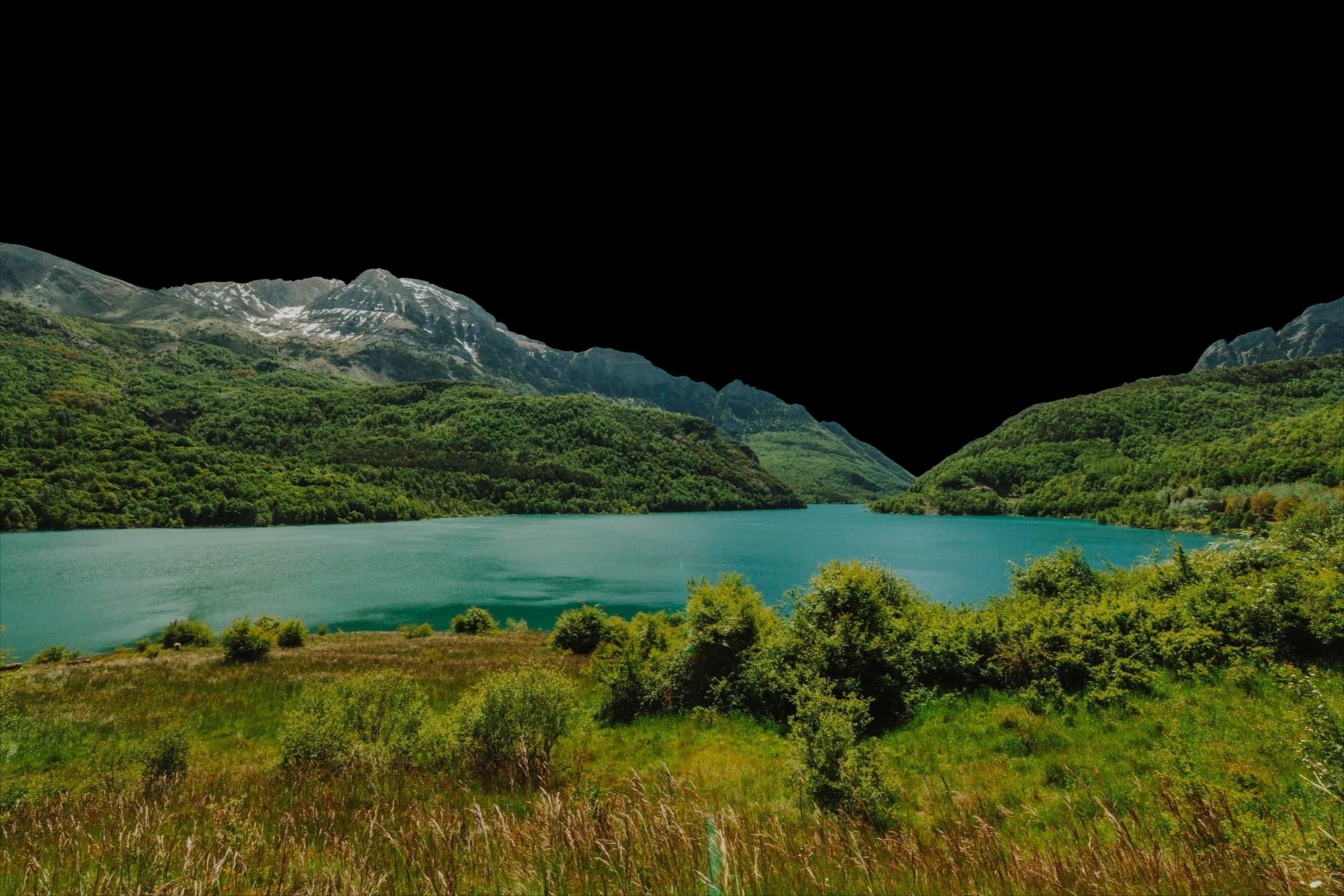 Alpine mountain peaks with snow
